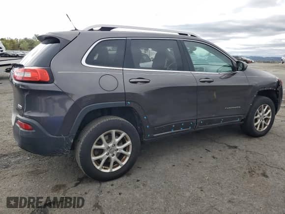 2014 Jeep Cherokee Latitude with VIN 1C4PJMCB9EW315772, listed as a Copart auction lot 86169155 with 107,636 mi miles and Salvage title. Bid and sale history available at DreamBid. Image 3.