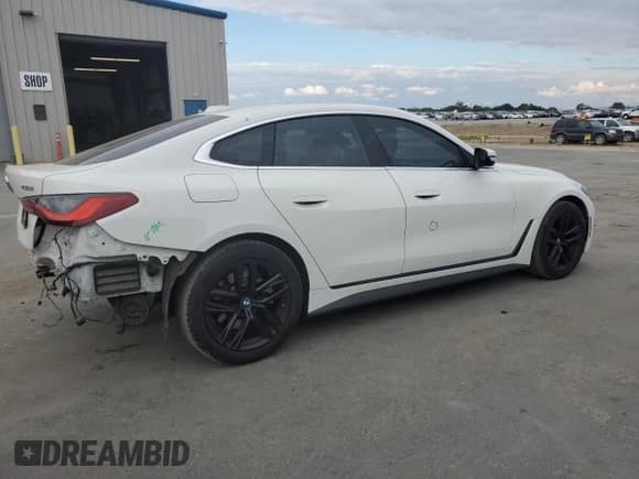 2022 BMW 4 Series 430i с VIN WBA63AV0XNFM01668, выставлен на аукционе Copart как лот 81702865 с пробегом 56 119 миль миль и Списание • Salvage title. История ставок и продаж доступна на DreamBid. Изображение 3.