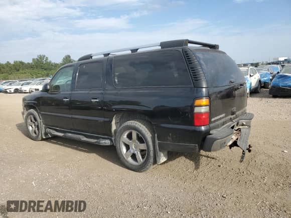 2006 Chevrolet Suburban LTZ with VIN 1GNFK16U86J176891, listed as a Copart auction lot 84904625 with 127,663 mi miles and Salvage title. Bid and sale history available at DreamBid. Image 2.