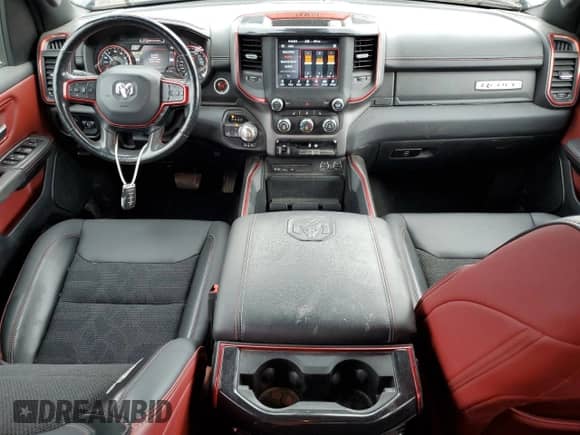 2019 Ram 1500 Rebel z VIN 1C6SRFET6KN796285, wystawiony jako Copart lot #60970545 z przebiegiem 63 425 mil mil oraz Szkoda całkowita • Salvage title. Historia ofert i sprzedaży dostępna na DreamBid. Obrazek 8.