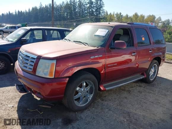 2002 Cadillac Escalade with VIN 1GYEK63N42R247833, listed as a IAAI auction lot 43402236 with 189,207 mi miles and . Bid and sale history available at DreamBid. Image 2.