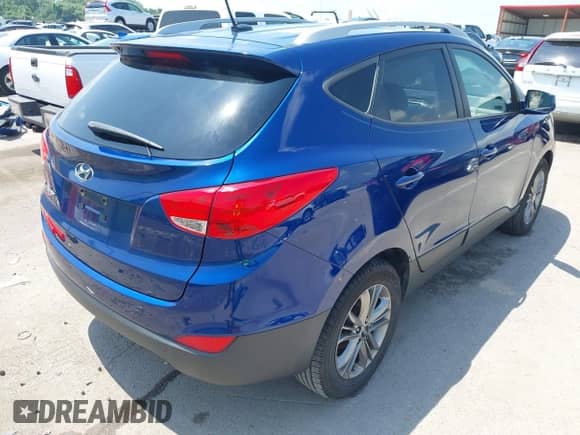 2015 Hyundai Tucson SE with VIN KM8JU3AG6FU987366, listed as a IAAI auction lot 42775890 with 84,499 mi miles and . Bid and sale history available at DreamBid. Image 4.