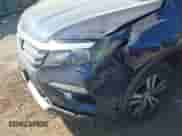 2016 Honda Pilot EX-L with VIN 5FNYF6H84GB064732, listed as a IAAI auction lot 43357342 with 220,420 mi miles and . Bid and sale history available at DreamBid. Image 6.