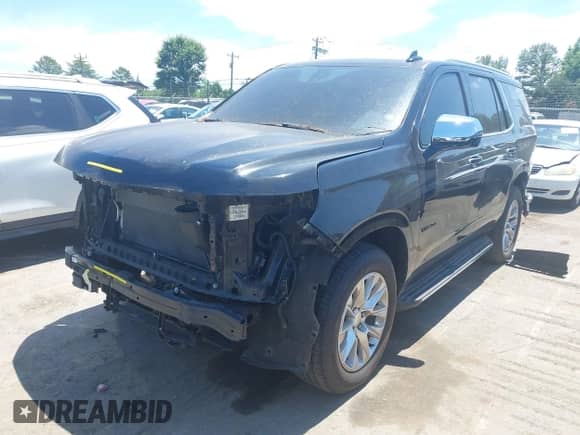 2021 Chevrolet Tahoe Premier z VIN 1GNSKSKD3MR116235, wystawiony jako IAAI lot #42624157 z przebiegiem 84 692 mil mil oraz . Historia ofert i sprzedaży dostępna na DreamBid. Obrazek 2.