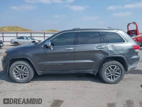 2021 Jeep Grand Cherokee 80th Anniversary with VIN 1C4RJFBG9MC550786, listed as a IAAI auction lot 43150307 with 63,701 mi miles and . Bid and sale history available at DreamBid. Image 14.