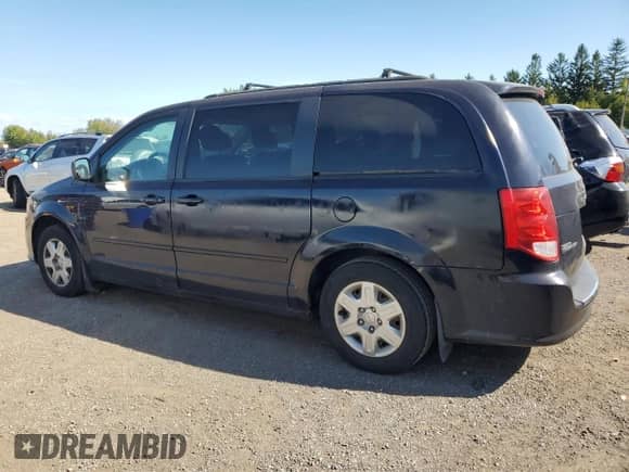 2011 Dodge Grand Caravan Express with VIN 2D4RN4DGXBR662848, listed as a Copart auction lot 70999465 with 219,412 mi miles and Salvage title. Bid and sale history available at DreamBid. Image 2.