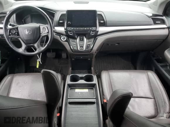 2020 Honda Odyssey Elite z VIN 5FNRL6H94LB033044, wystawiony jako Copart lot #89712385 z przebiegiem Nie podano mil oraz Szkoda całkowita • Salvage title. Historia ofert i sprzedaży dostępna na DreamBid. Obrazek 8.