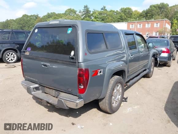 2012 Chevrolet Colorado 2LT z VIN 1GCHTDFE2C8147348, wystawiony jako IAAI lot #43290576 z przebiegiem 219 422 mil mil oraz . Historia ofert i sprzedaży dostępna na DreamBid. Obrazek 4.