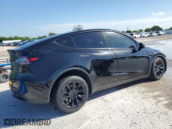 2024 Tesla Model Y с VIN 7SAYGDED9RF089599, выставлен на аукционе Copart как лот 84059915 с пробегом 32 641 миль миль и Списание • Salvage title. История ставок и продаж доступна на DreamBid. Изображение 3.