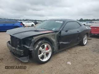 2012 Dodge Challenger R/T Plus with VIN 2C3CDYBT3CH259481, listed as a Copart auction lot 69228864 with 51,503 mi miles and Salvage title. Bid and sale history available at DreamBid. Image 1.