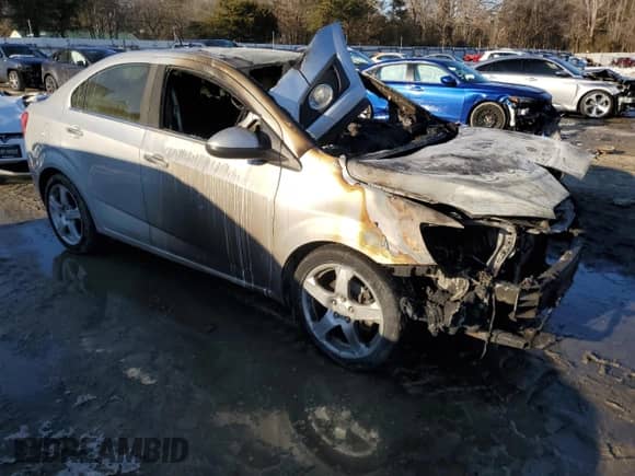 2013 Chevrolet Sonic LTZ with VIN 1G1JE5SH1D4107068, listed as a Copart auction lot 53429765 with Not provided miles and Non repairable. Bid and sale history available at DreamBid. Image 4.