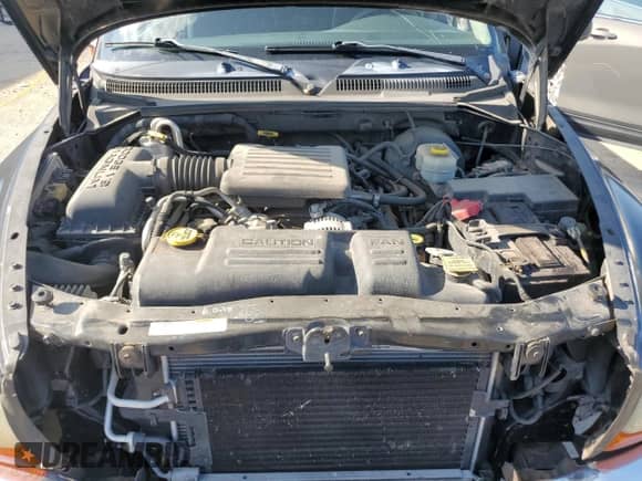 2002 Dodge Dakota с VIN 1B7GG46N32S595986, выставлен на аукционе Copart как лот 62066955 с пробегом 91 711 миль миль и Списание • Salvage title. История ставок и продаж доступна на DreamBid. Изображение 11.