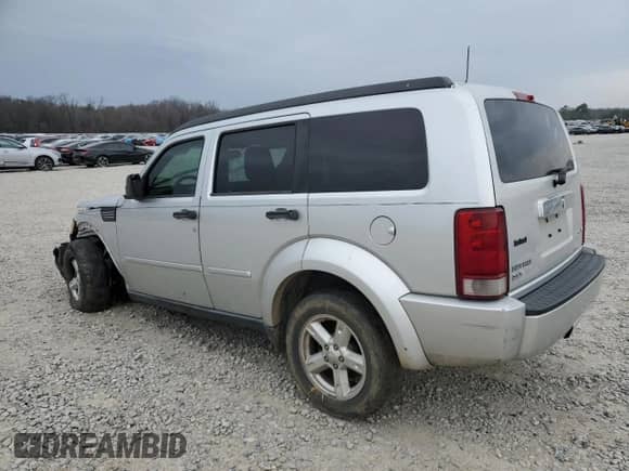 2008 Dodge Nitro SLT with VIN 1D8GU58K28W252977, listed as a Copart auction lot 47455585 with 123,425 mi miles and Salvage title. Bid and sale history available at DreamBid. Image 2.