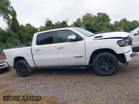 2020 Ram 1500 Lone Star with VIN 1C6SRFFT8LN299903, listed as a IAAI auction lot 43197899 with 50,350 mi miles and . Bid and sale history available at DreamBid. Image 13.
