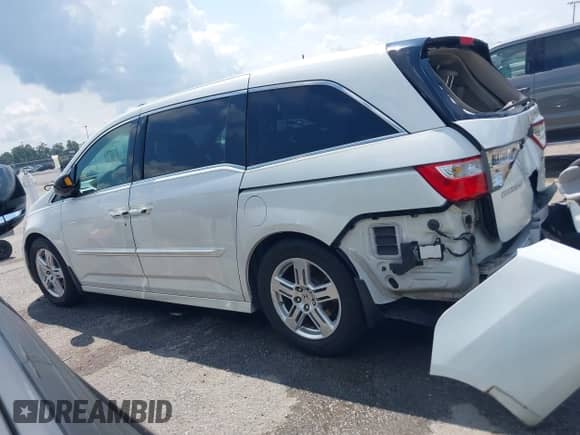 2012 Honda Odyssey Touring с VIN 5FNRL5H99CB115300, выставлен на аукционе IAAI как лот 42890660 с пробегом 120 808 миль миль и . История ставок и продаж доступна на DreamBid. Изображение 14.