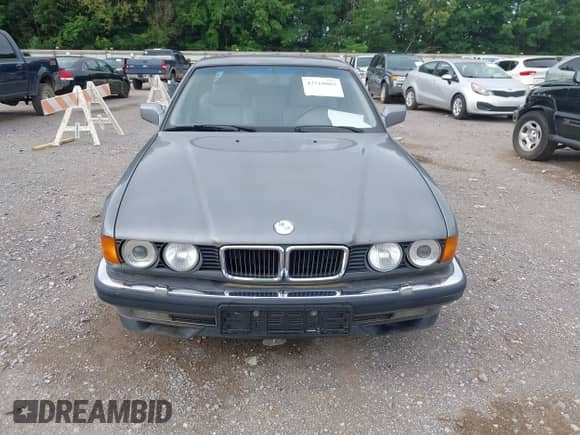 1994 BMW 7 Series with VIN WBAGD8323RDE87893, listed as a IAAI auction lot 42518003 with 196,154 mi miles and . Bid and sale history available at DreamBid. Image 6.