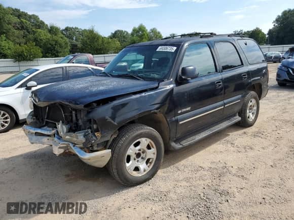 2001 Chevrolet Tahoe LS with VIN 1GNEC13T31R140928, listed as a Copart auction lot 69306735 with 240,666 mi miles and Salvage title. Bid and sale history available at DreamBid. Image 1.