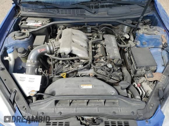 2011 Hyundai Genesis Coupe Track z VIN KMHHU6KH7BU061074, wystawiony jako Copart lot #70147024 z przebiegiem 121 711 mil mil oraz Szkoda całkowita • Salvage title. Historia ofert i sprzedaży dostępna na DreamBid. Obrazek 11.