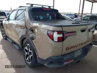 2023 Hyundai Santa Cruz Limited z VIN 5NTJEDAF1PH045897, wystawiony jako IAAI lot #43249004 z przebiegiem 45 646 mil mil oraz . Historia ofert i sprzedaży dostępna na DreamBid. Obrazek 3.