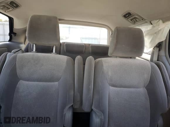 2010 Toyota Sienna CE z VIN 5TDKK4CC4AS329167, wystawiony jako Copart lot #80783565 z przebiegiem 120 600 mil mil oraz Szkoda całkowita • Salvage title. Historia ofert i sprzedaży dostępna na DreamBid. Obrazek 10.