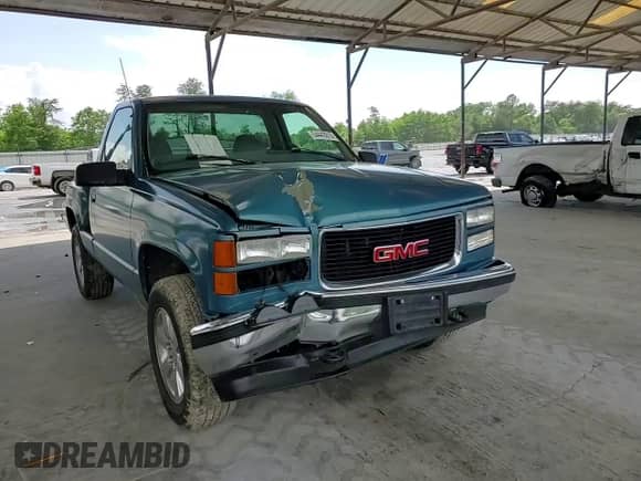 1997 GMC Sierra 1500 с VIN 1GTEK14R2VZ514577, выставлен на аукционе Copart как лот 54443015 с пробегом 214 823 миль миль и Списание • Salvage title. История ставок и продаж доступна на DreamBid. Изображение 13.