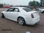 2014 Chrysler 300 SRT-8 с VIN 2C3CCAFJ6EH156853, выставлен на аукционе IAAI как лот 42370748 с пробегом 44 434 миль миль и . История ставок и продаж доступна на DreamBid. Изображение 3.