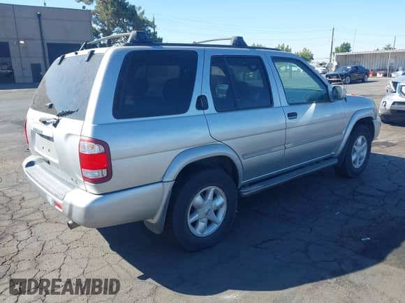 2002 Nissan Pathfinder SE with VIN JN8DR09Y72W733098, listed as a IAAI auction lot 43239221 with 236,085 mi miles and . Bid and sale history available at DreamBid. Image 4.