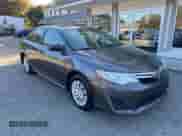 2014 Toyota Camry XLE with VIN 4T4BF1FKXER387227, listed as a IAAI auction lot 43430506 with 194,348 mi miles and . Bid and sale history available at DreamBid. Image 1.