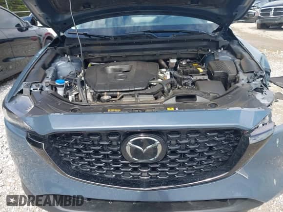2025 Mazda CX-5 S Carbon Edition z VIN JM3KFBCM8S0646821, wystawiony jako IAAI lot #42610837 z przebiegiem Nie podano mil oraz . Historia ofert i sprzedaży dostępna na DreamBid. Obrazek 10.