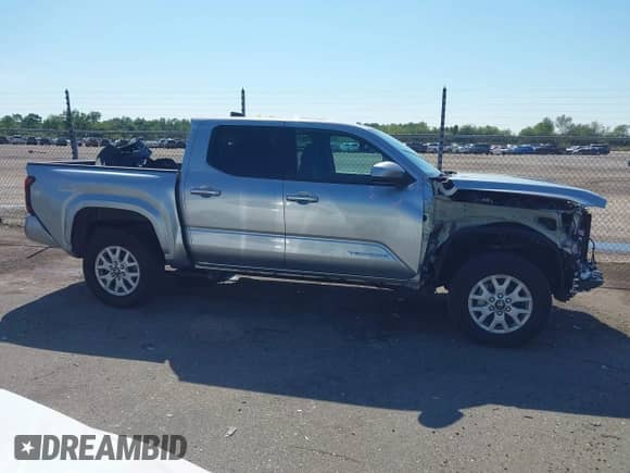 2024 Toyota Tacoma TRD Off Road with VIN 3TMLB5JN8RM010395, listed as a IAAI auction lot 43375716 with 20,319 mi miles and . Bid and sale history available at DreamBid. Image 14.