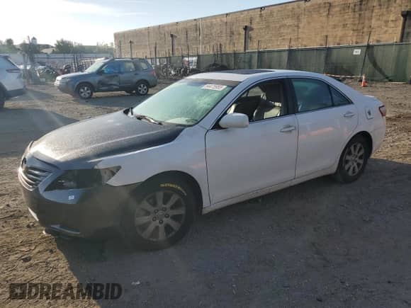 2009 Toyota Camry XLE with VIN 4T1BE46K79U813685, listed as a Copart auction lot 84475955 with 178,860 mi miles and Salvage title. Bid and sale history available at DreamBid. Image 1.