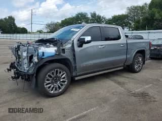 2024 GMC Sierra 1500 Denali Ultimate with VIN 1GTUUHE82RZ243966, listed as a Copart auction lot 64274595 with 23,369 mi miles and Salvage title. Bid and sale history available at DreamBid. Image 1.