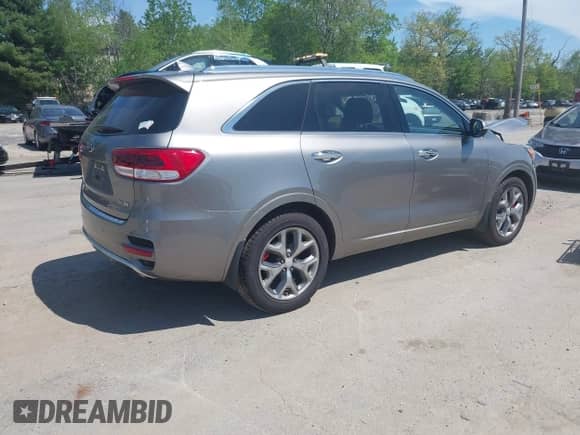 2017 Kia Sorento SX z VIN 5XYPKDA56HG242677, wystawiony jako IAAI lot #42244093 z przebiegiem 98 644 mil mil oraz . Historia ofert i sprzedaży dostępna na DreamBid. Obrazek 4.