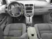 2007 Dodge Caliber SXT z VIN 1B3HB48B47D588015, wystawiony jako Copart lot #72108394 z przebiegiem 103 301 mil mil oraz Szkoda całkowita • Salvage title. Historia ofert i sprzedaży dostępna na DreamBid. Obrazek 8.