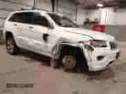 2015 Jeep Grand Cherokee Overland with VIN 1C4RJFCG3FC942325, listed as a IAAI auction lot 43140141 with 105,099 mi miles and . Bid and sale history available at DreamBid. Image 1.