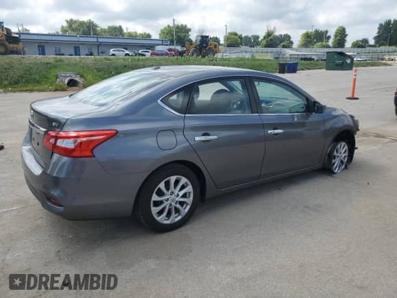2019 Nissan Sentra SV z VIN 3N1AB7APXKY318044, wystawiony jako Copart lot #67408985 z przebiegiem 107 171 mil mil oraz Szkoda całkowita • Salvage title. Historia ofert i sprzedaży dostępna na DreamBid. Obrazek 3.