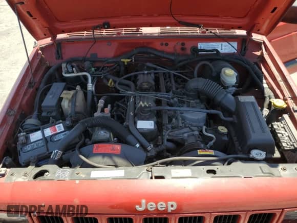 1999 Jeep Grand Cherokee with VIN 1J4FT67SXXL636357, listed as a Copart auction lot 67971004 with 158,134 mi miles and Clean title. Bid and sale history available at DreamBid. Image 12.