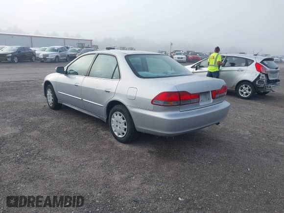 2002 Honda Accord LX with VIN 1HGCG56462A162276, listed as a IAAI auction lot 42814660 with 171,652 mi miles and . Bid and sale history available at DreamBid. Image 3.