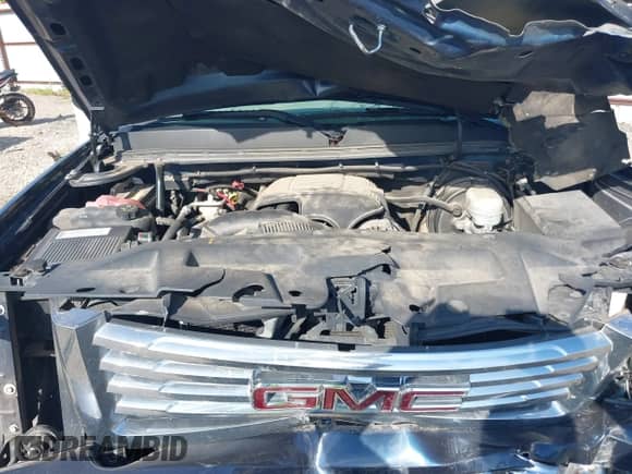 2007 GMC Sierra 1500 SLE2 z VIN 2GTEK19J871580825, wystawiony jako IAAI lot #42586800 z przebiegiem Nie podano mil oraz . Historia ofert i sprzedaży dostępna na DreamBid. Obrazek 10.