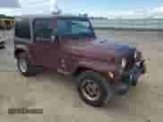 2003 Jeep Wrangler Sahara с VIN 1J4FA59S63P302987, выставлен на аукционе Copart как лот 81738545 с пробегом 93 964 миль миль и Чистый • Clean title. История ставок и продаж доступна на DreamBid. Изображение 4.