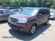 2013 Honda Pilot EX-L with VIN 5FNYF3H50DB040007, listed as a IAAI auction lot 42744260 with 143,077 mi miles and . Bid and sale history available at DreamBid. Image 2.