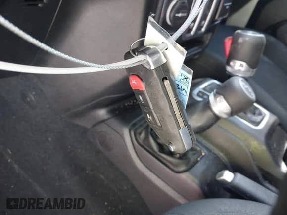 2020 Jeep Wrangler Sport S with VIN 1C4GJXAG3LW275413, listed as a IAAI auction lot 41884921 with 63,727 mi miles and . Bid and sale history available at DreamBid. Image 11.