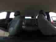 2018 Chevrolet Cruze LT z VIN 3G1BE6SM6JS588387, wystawiony jako IAAI lot #42875402 z przebiegiem 117 993 mil mil oraz . Historia ofert i sprzedaży dostępna na DreamBid. Obrazek 18.