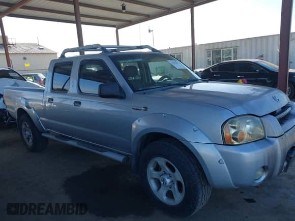 2003 Nissan Frontier SVE with VIN 1N6MD29Y63C465571, listed as a IAAI auction lot 41502613 with 175,996 mi miles and . Bid and sale history available at DreamBid. Image 14.