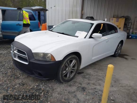 2013 Dodge Charger SXT with VIN 2C3CDXJG8DH528767, listed as a IAAI auction lot 41627596 with 204,619 mi miles and . Bid and sale history available at DreamBid. Image 2.