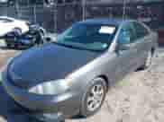2005 Toyota Camry XLE with VIN 4T1BF30K45U615723, listed as a IAAI auction lot 43091390 with 101,315 mi miles and . Bid and sale history available at DreamBid. Image 2.
