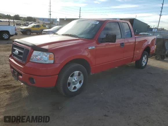 2007 Ford F-150 STX with VIN 1FTRX12W87KD46533, listed as a Copart auction lot 84247045 with 125,004 mi miles and Salvage title. Bid and sale history available at DreamBid. Image 1.