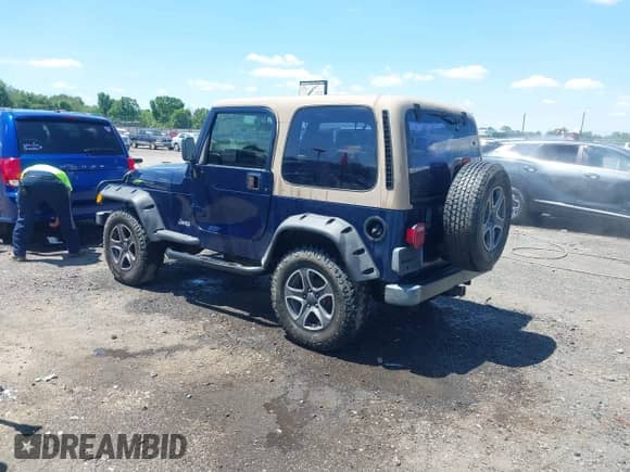 2001 Jeep Wrangler SE with VIN 1J4FA29P01P344644, listed as a IAAI auction lot 42170936 with 130,938 mi miles and . Bid and sale history available at DreamBid. Image 3.