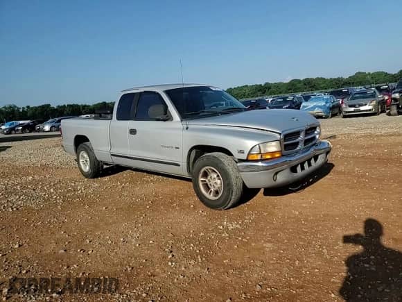 2000 Dodge Dakota z VIN 1B7GL22XXYS620835, wystawiony jako Copart lot #61948715 z przebiegiem 186 850 mil mil oraz Szkoda całkowita • Salvage title. Historia ofert i sprzedaży dostępna na DreamBid. Obrazek 13.
