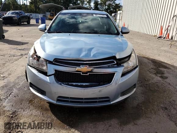 2012 Chevrolet Cruze 1LT z VIN 1G1PF5SC3C7185621, wystawiony jako Copart lot #86117745 z przebiegiem 96 191 mil mil oraz Szkoda całkowita • Salvage title. Historia ofert i sprzedaży dostępna na DreamBid. Obrazek 5.